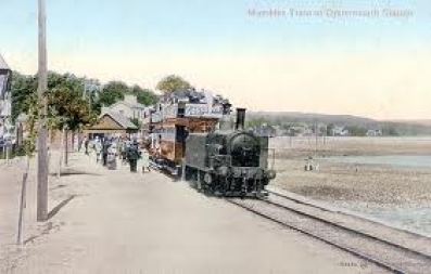 An early train operating on the Mumbles railway which ran along the bay